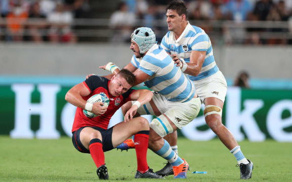 Argentina's Tomas Lavanini high tackles Owen Farrell of England and is then sent off