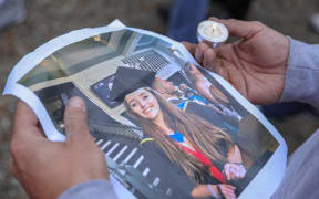 Backpackers gather in Queenstown for a vigil for Grace Millane