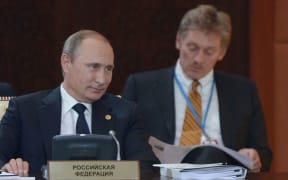 Russian President Vladimir Putin and press secretary Dmitry Peskov attend an expanded format meeting of the Supreme Eurasian Economic Council. Aleksey Nikolskyi/RIA Novosti