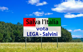 An election billboard which says the only hope for saving Italy is to vote for Matteo Salvini's Northern League party.