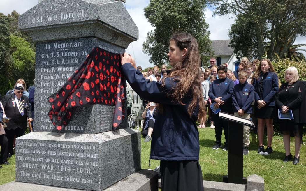 Charlotte Butler unveils WWI soldiers names on Omata memorial wall