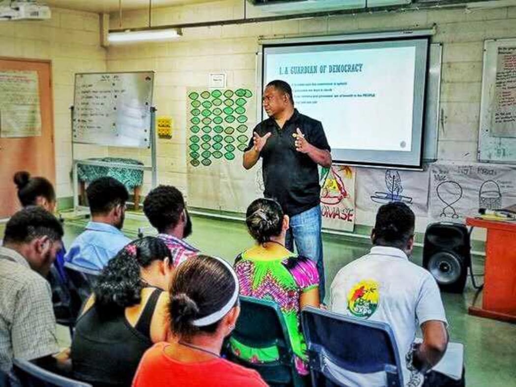Scott Waide speaks at a Transparency International PNG youth programme.