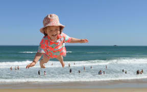 Flying visit . . . Olivia Naziris (20 months), from Wellington was one of many people who enjoyed the Dunedin beaches over the Christmas weekend. Hoisted high over St Kilda beach by her father Christopher, they were in Dunedin visiting family during the holidays.

2016 calendar