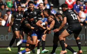 Deine Mariner of Samoa is tackled during the Men's Pacific Championships Final match between New Zealand Kiwis and Toa Samoa.