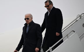 (FILES) US President Joe Biden, with son Hunter Biden, arrives at Hancock Field Air National Guard Base in Syracuse, New York, on February 4, 2023. The US Justice Department on Friday escalated its investigation into President Joe Biden's son Hunter, naming a special counsel amid allegations he engaged in illicit business deals overseas.
Attorney General Merrick Garland appointed Delaware federal prosecutor David Weiss, who recently investigated Hunter Biden on tax and gun charges in a case that remains open. Weiss, who opened his probe in 2019, recently revealed that he was investigating Biden along other lines, and Garland said Weiss had requested special counsel status to be able to pursue his probe more widely. (Photo by ANDREW CABALLERO-REYNOLDS / AFP)