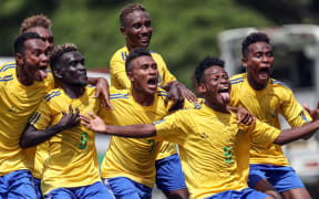 Solomon Islands players celebrate on their way to the World Cup