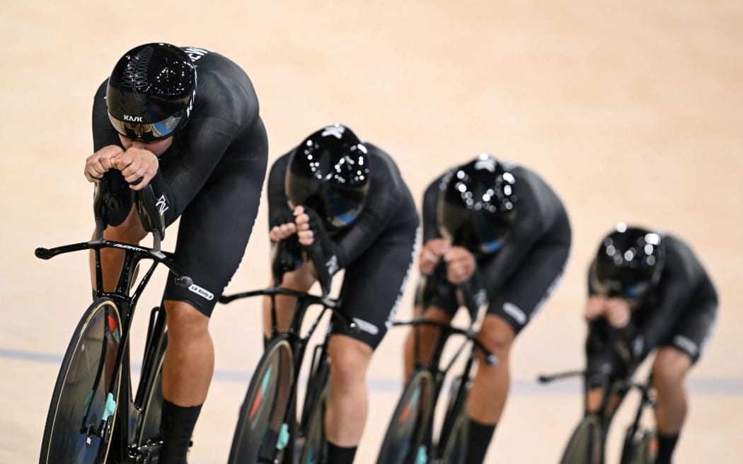 New Zealand's Nicole Shields, New Zealand's Emily Shearman, New Zealand's Bryony Botha and New Zealand's Ally Wollaston compete in a women's track cycling team pursuit first round of the Paris 2024 Olympic Games at the Saint-Quentin-en-Yvelines National Velodrome in Montigny-le-Bretonneux, south-west of Paris, on August 7, 2024. (Photo by SEBASTIEN BOZON / AFP)