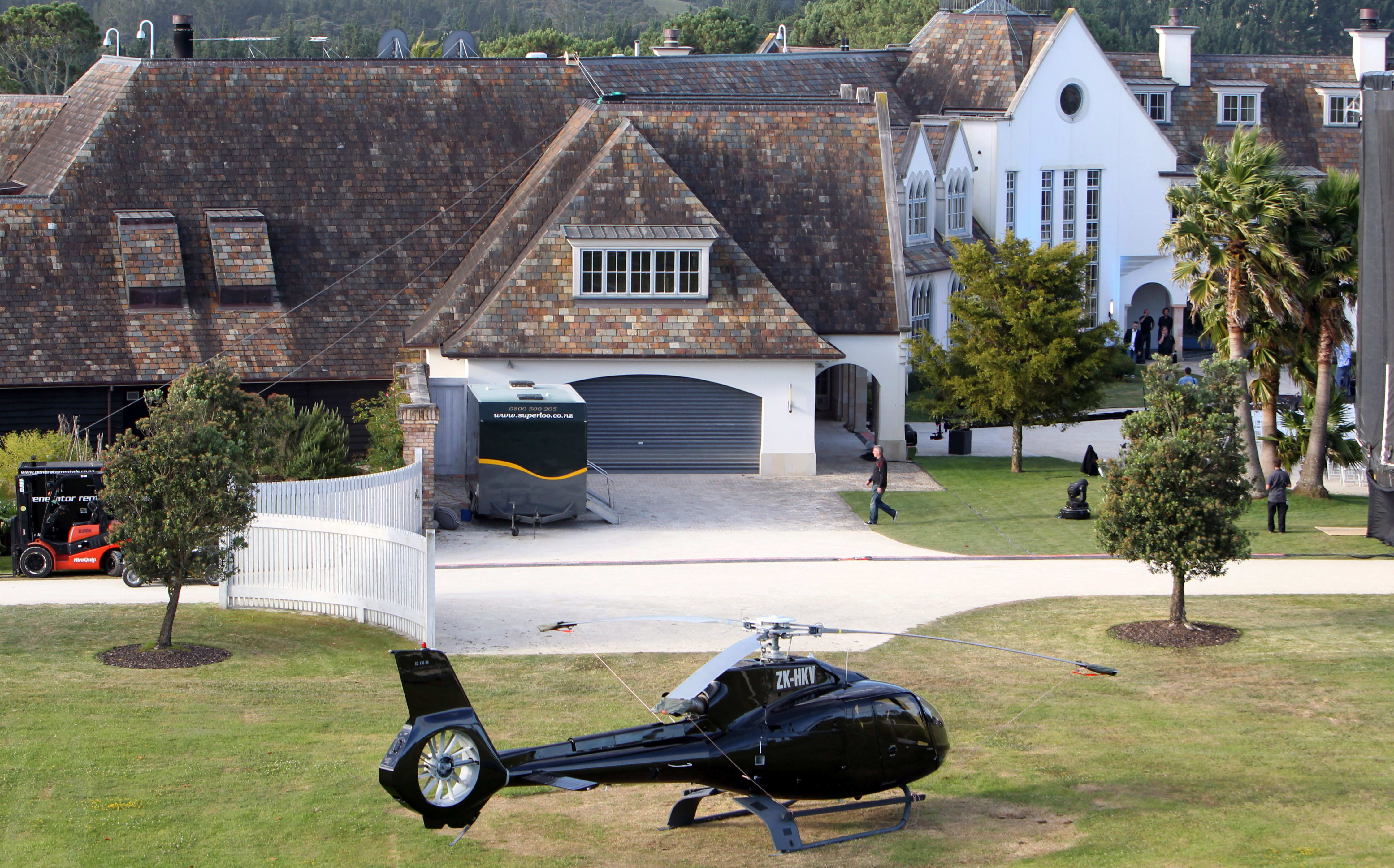 A helicopter parked outside the mansion of Megaupload founder Kim Dotcom before the launch of his new website at a press conference in Auckland on January 20, 2013.