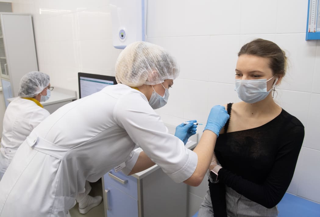 A health worker injects the Sputnik V coronavirus vaccine at the Covid-19 vaccination centre in Moscow, Russia. Iliya Pitalev / Sputnik