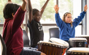 Children engaged in music therapy