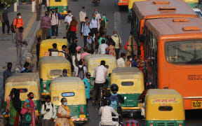 A crowded road near in New Delhi, India on 9 September. Cases and deaths from Covid-19 have soared in India.