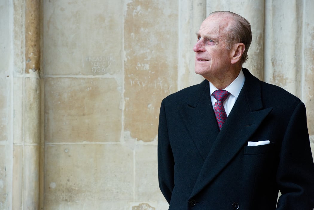 Britain's Prince Phillip, The Duke of Edinburgh, looks at the assembled choir following the annual Commonwealth Day Observance Service at Westminster Abbey in central London, England, on March 14, 2011.