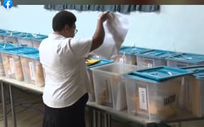 Collecting a new box of envelopes from the back of the hall. All the action was livestreamed for the people of Vanuatu, and the world.