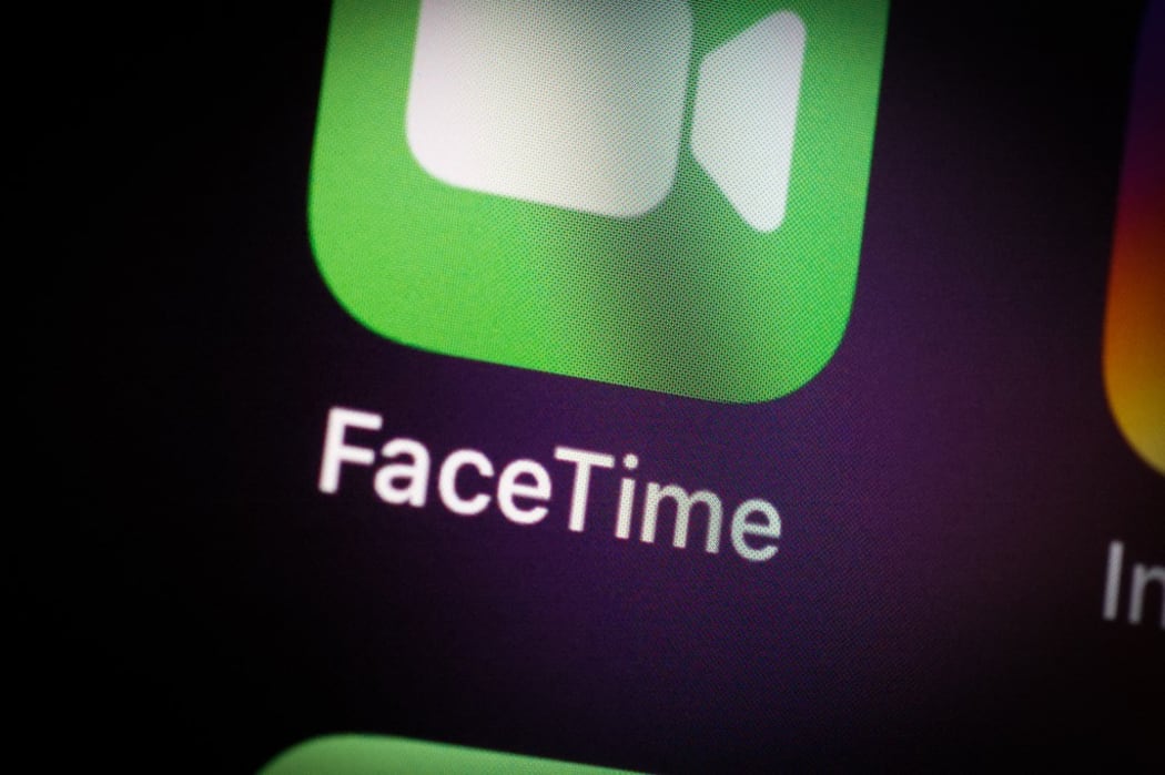 The FaceTime application icon is seen on an iPhone home screen in Warsaw, Poland on March 3, 2021.