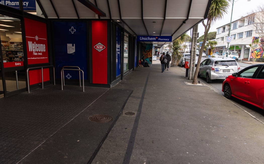 Black line outside New World in Newtown