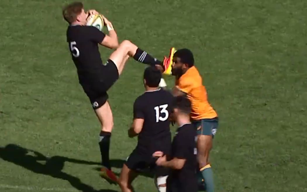 Jordie Barrett of the All Blacks kicks Marika Koroibete of the Wallabies in the face during the Rugby Union Bledisloe Cup Game 3 between the Australia Wallabies and the New Zealand All Blacks at Optus Stadium in Perth
