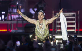 British singer-songwriter Robbie Williams performs at the Heartland Festival in Kvaerndrup, Denmark on June 10, 2023.