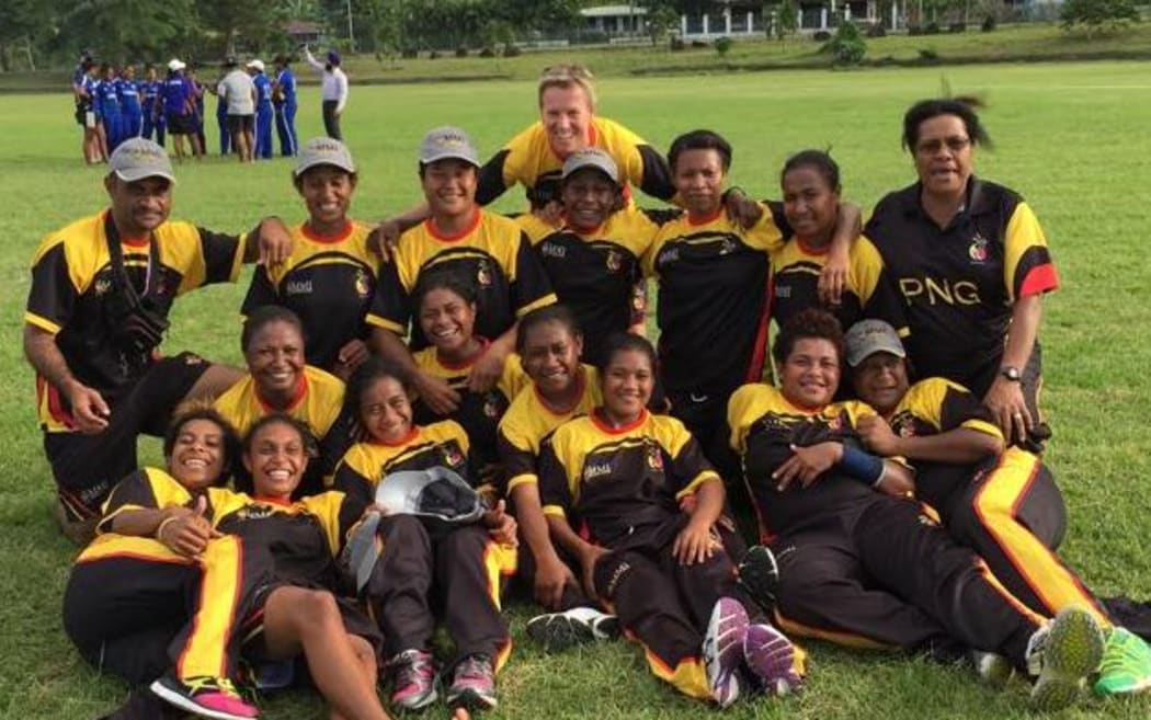 The PNG Lewas cricket team celebrate beating Samoa.
