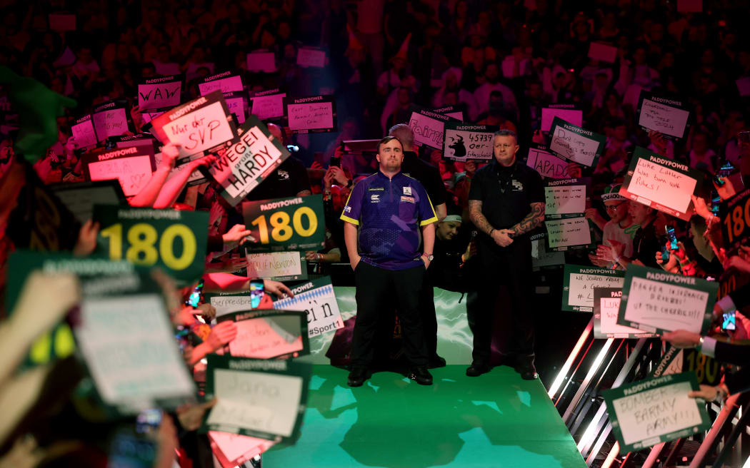 Luke Littler of England enters during his semi final match against Rob Cross of England on day 15 of the  World Darts Championship at Alexandra Palace.