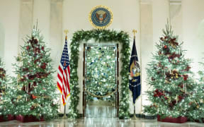 Christmas decorations are seen in the Grand Foyer of the White House during a media tour on Monday, 1 December 2025.