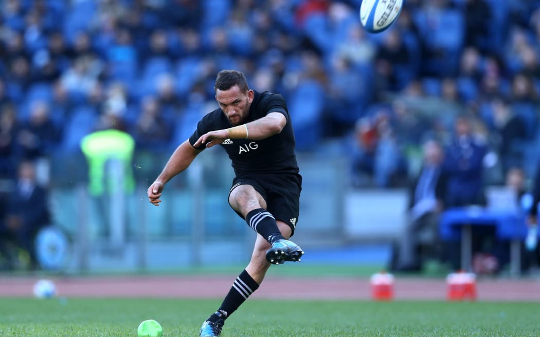 Aaron Cruden goes for goal against Italy.