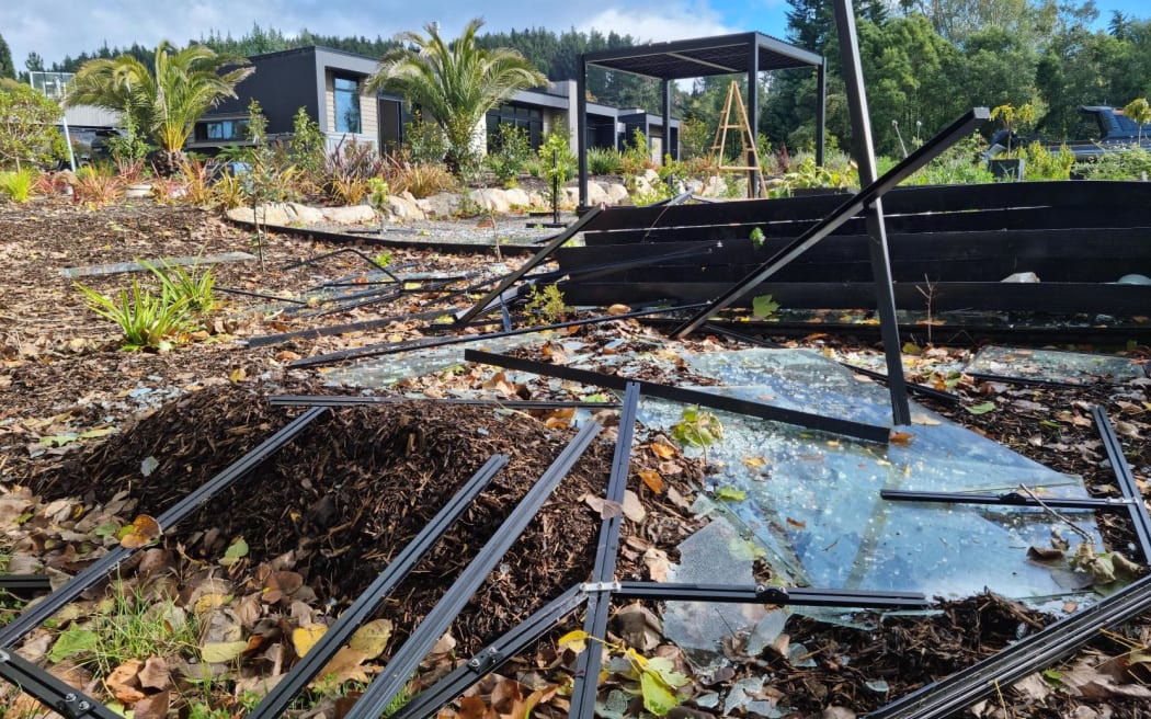 A glasshouse and pergola were destroyed and trees uprooted at James Petersen's property in Westdale Road, but his house was thankfully undamaged.