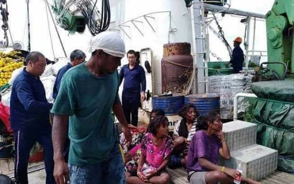 Some of the seven survivors shortly after being rescued.