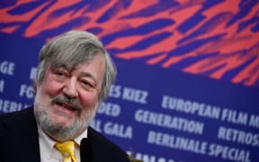 British actor and comedian Stephen Fry attends a press conference for the film "Treasure" presented in the Berlinale Special Gala section at the 74th Berlinale, Europe's first major film festival of the year, in Berlin on February 17, 2024.