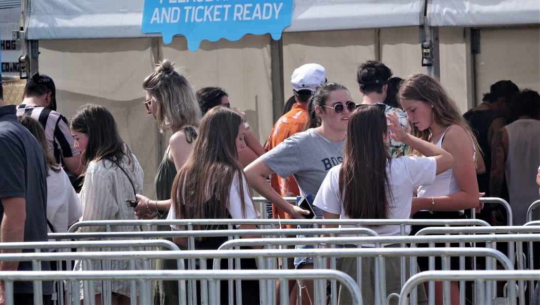 Concertgoers queuing up at Trafalgar Park.