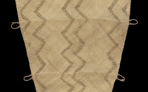 Te Rā, dated circa 1770–1800 and made from harakeke, kererū, kāhu and kākā feathers, dog skin. On loan from the Trustees of the British Museum.