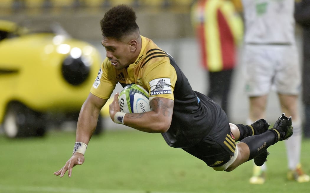 Ardie Savea scores the first of his two tries for the Hurricanes in their 27-20 win over the Highlanders.