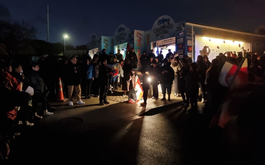 About 100 people gathered in West Auckland at 6.30am, on 30 May 2024, for a National Action Day aimed at government policies and rhetoric toward Māori.