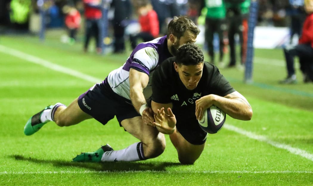 Codie Taylor goes over to score against Scotland at Murrayfield.