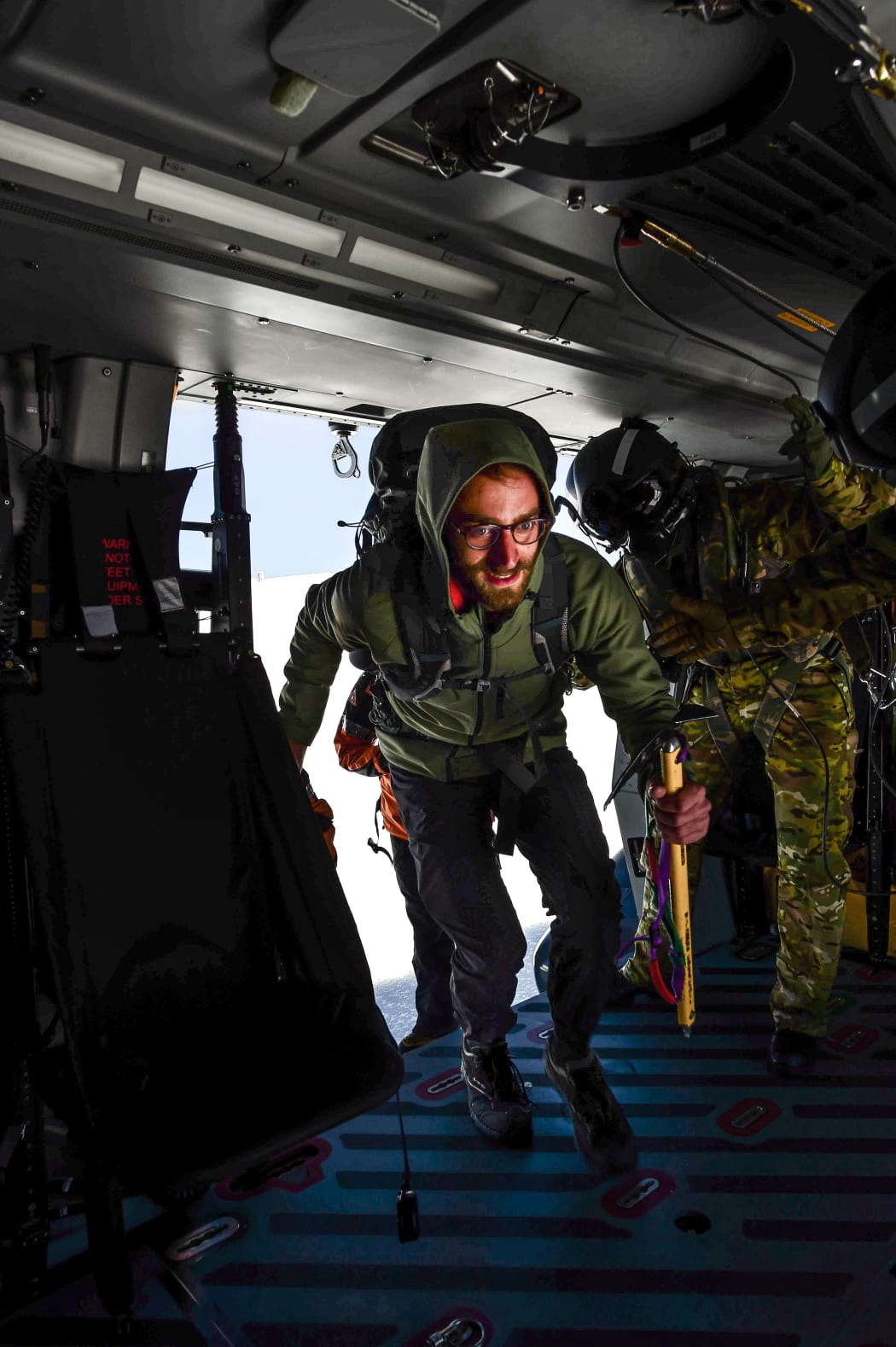 The tramper is helped on board the Air Force NH90 helicopter.