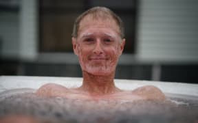 Josh Komen in an ice bath.
