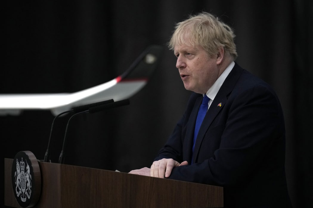 Britain's Prime Minister Boris Johnson makes a speech on immigration, at Lydd Airport on 14 April 2022. He said the navy would take over patrolling the Chanel for migrants trying to cross from France, announcing a plan to send those who made the crossing to Rwanda.