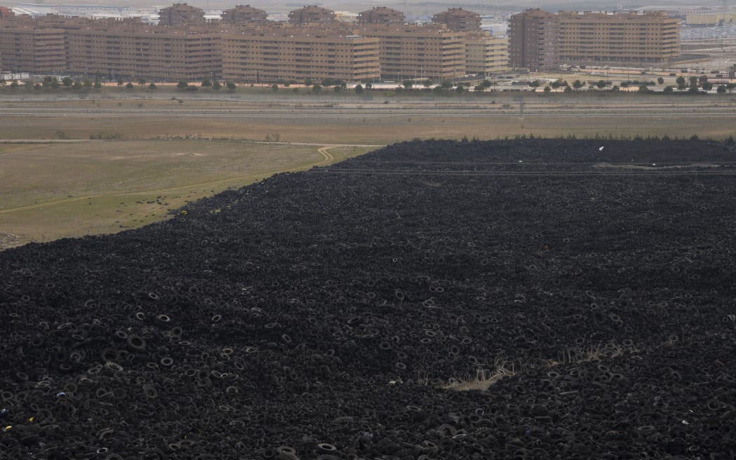 Wheels are stored for recycling in a field in Sesena, near Madrid, on January 09, 2013.