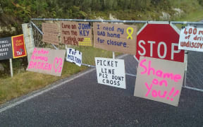 Families of the Pike River dead protest at the sealing of the mine