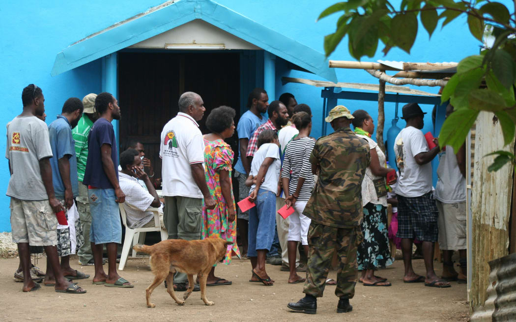 Voters queue at an Efate polling station,  Vanuatu election 2012.