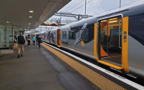 The first Te Huia commuter train from Hamilton to Auckland arrives at Papakura on Tuesday morning.