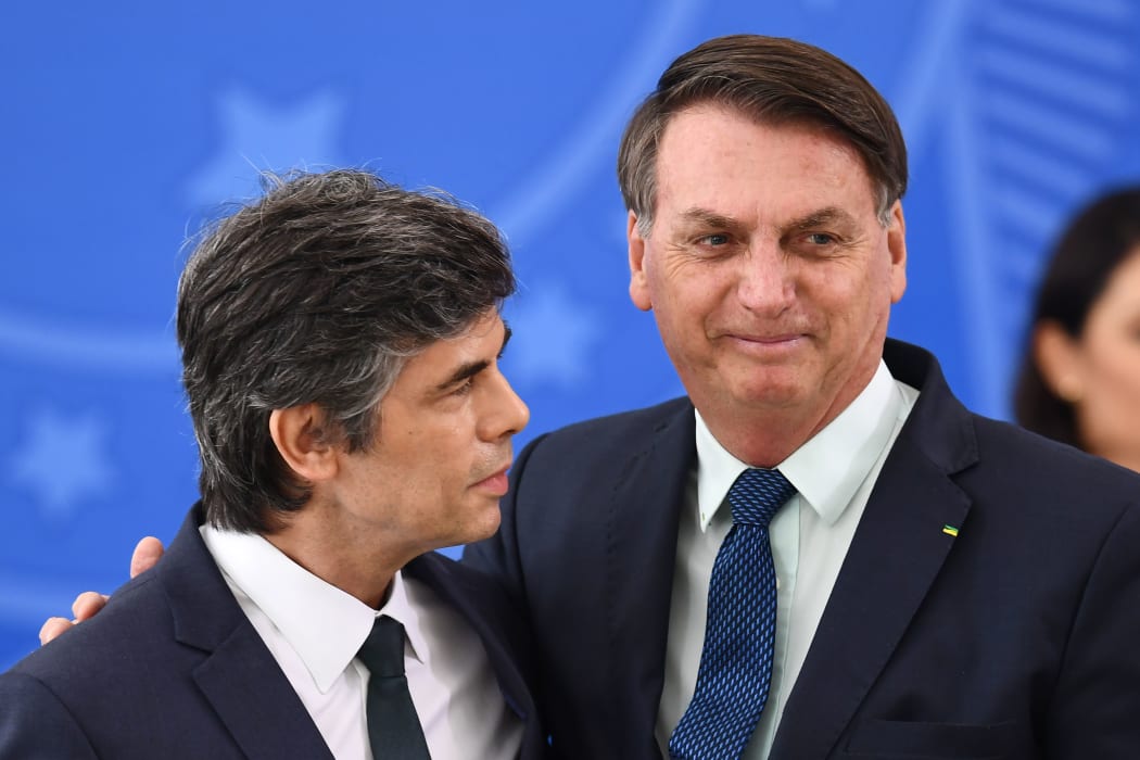 Nelson Teich, left, and  Brazilian President  Jair Bolsonaro during his swearing-in ceremony less than a month ago