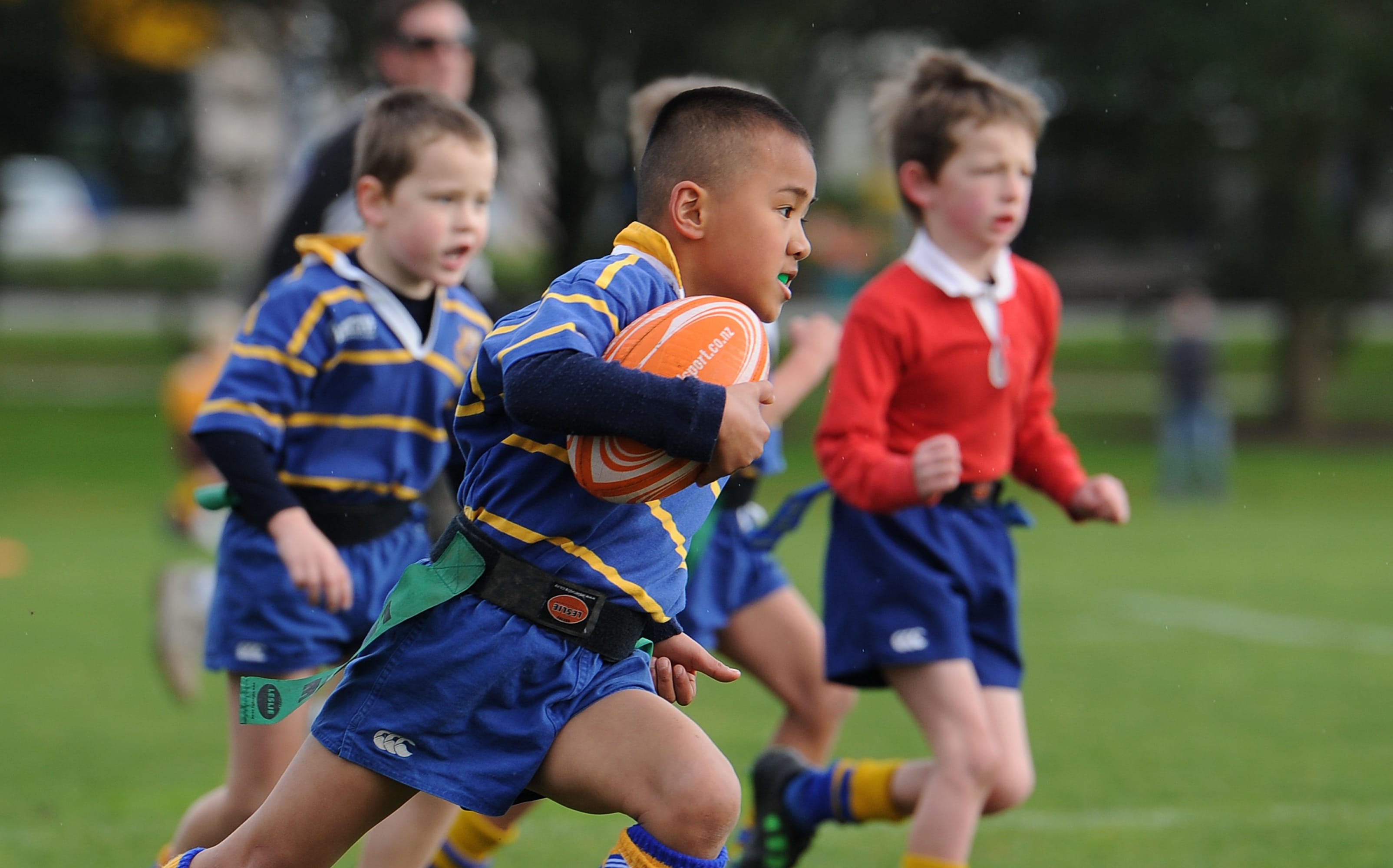 Children play a school rugby game
