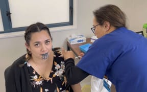 Kaniwa Kupenga-Tamarama getting her Covid-19 vaccine at a clinic in Tairawhiti Gisborne.