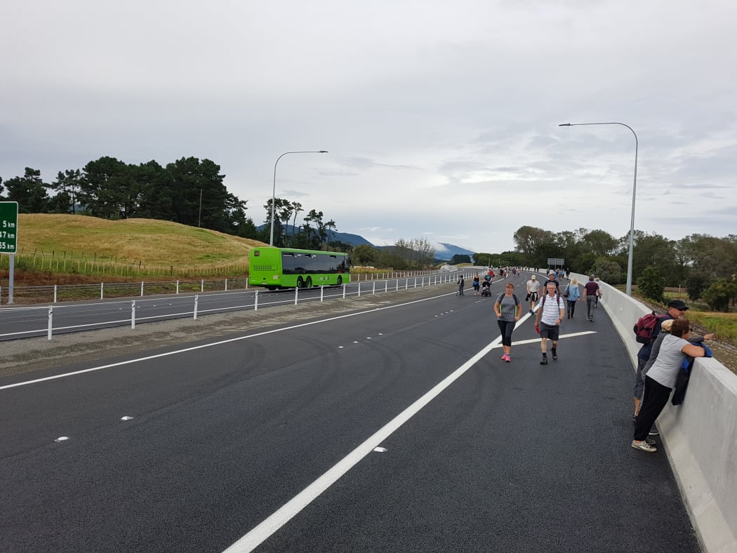 pedestrians checking out the Kapiti Expressway
