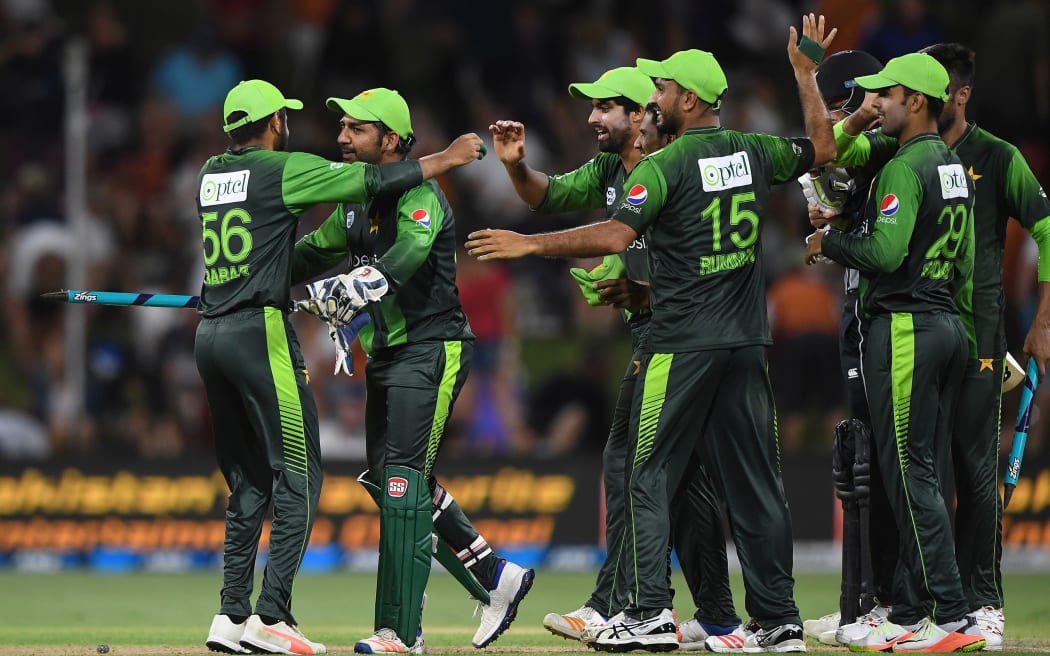 Pakistan captain Sarfraz Ahmed celebrates with team.