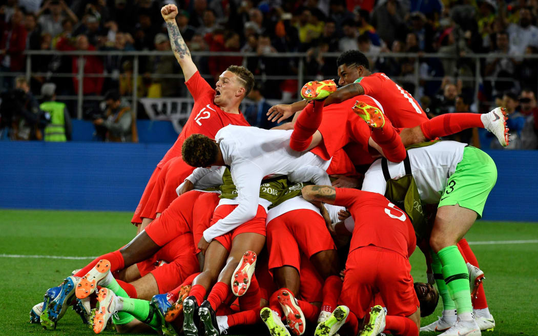 England's players celebrate winning the penalty shootout at the end of the Russia 2018 World Cup round of 16 football match between Colombia and England.