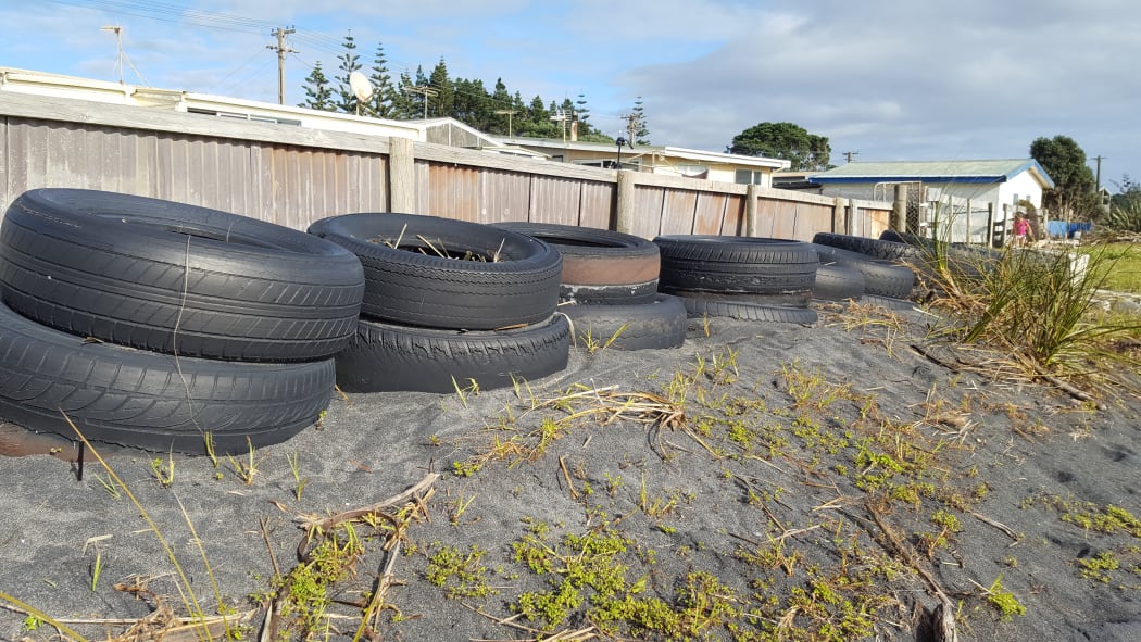 Tyres used as a make-shift seawall at East Beach in Waitara, Taranaki.