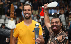 Richard Gasquet of France with the trophy after winning his singles final match against Cameron Norrie at the 2023 Men's ASB Classic.