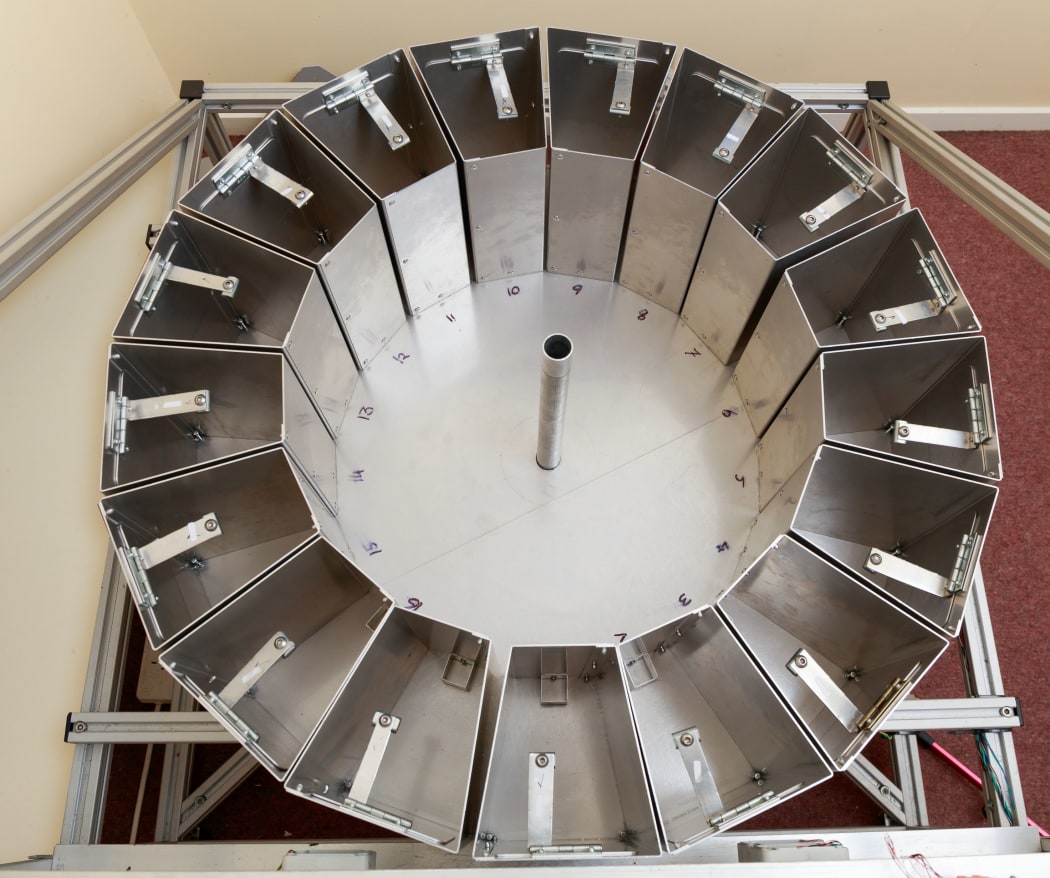 Samples of water for the dogs to sniff are put in a rotating carousel.