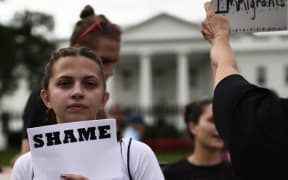 Immigrants and supporters demonstrate during a rally in support of the Deferred Action for Childhood Arrivals (DACA) in front of the White House on September 5, 2017 in Washington DC.
